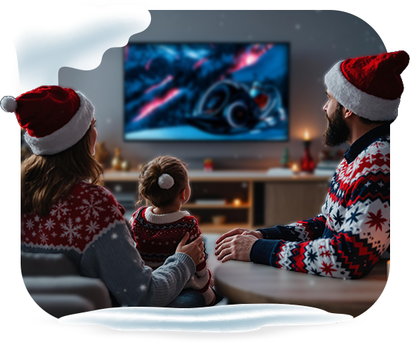 Rodzina oglądająca Film od Świętego Mikołaja